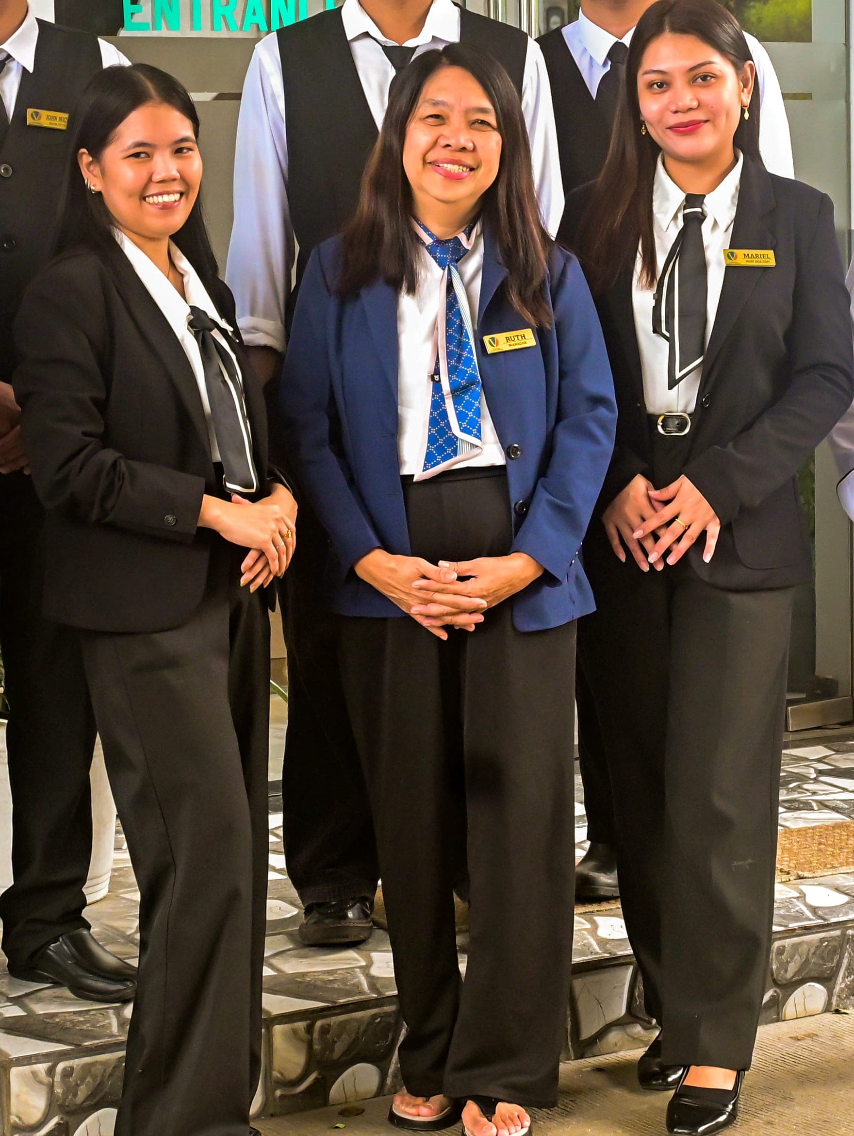 Front-of-house staff at the entrance to JVergara Resort Hotel